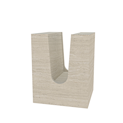 The Alba by Annuello – a handcrafted natural stone piece with a sculptural curved form, designed to function as both a side table and a magazine stand. Shown in an upright position with smooth veining and architectural lines.