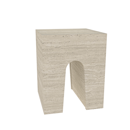 The Alba by Annuello – a handcrafted natural stone piece with a sculptural curved form, designed to function as both a side table and a magazine stand. Shown in an upright position with smooth veining and architectural lines.