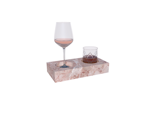 A rectangular pink marble drink tray with two circular indentations, designed for serving beverages or holding glasses. The tray features natural veining and a polished finish, combining functionality with luxurious craftsmanship.